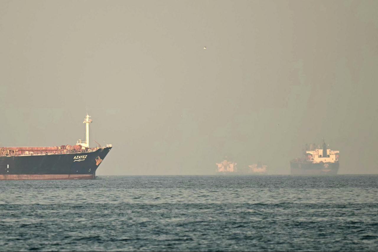 Cargo ships and tankers are seen off coast city of Fujairah, in the Strait of Hormuz in the northern Emirate, February 25, 2026. (AFP Photo)