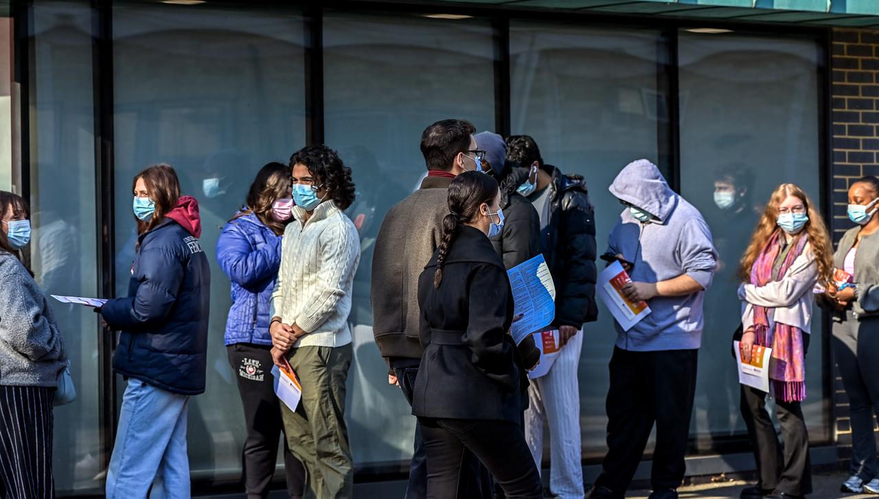 Students wearing face masks queue to receive meningitis vaccinations at the University of Kent, in Canterbury, England, UK, March 19, 2026. (AA Photo)