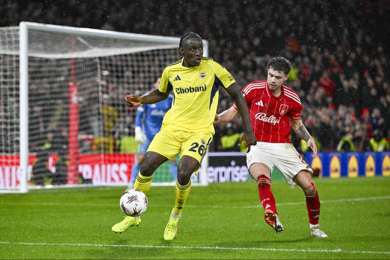 Cherif (26) of Fenerbahce in action against Neco Williams (3) of Nottingham Forest during UEFA Europa League round of 16 play-off match between Nottingham Forest and Fenerbahce at City Ground Stadium in Nottingham, United Kingdom on Feb. 26, 2026. (AA Photo)
