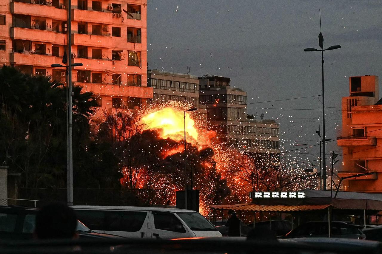 A fireball rises from the site of an Israeli airstrike that targeted a building in Beirut’s Bashoura neighbourhood early on March 18, 2026. (AFP Photo)