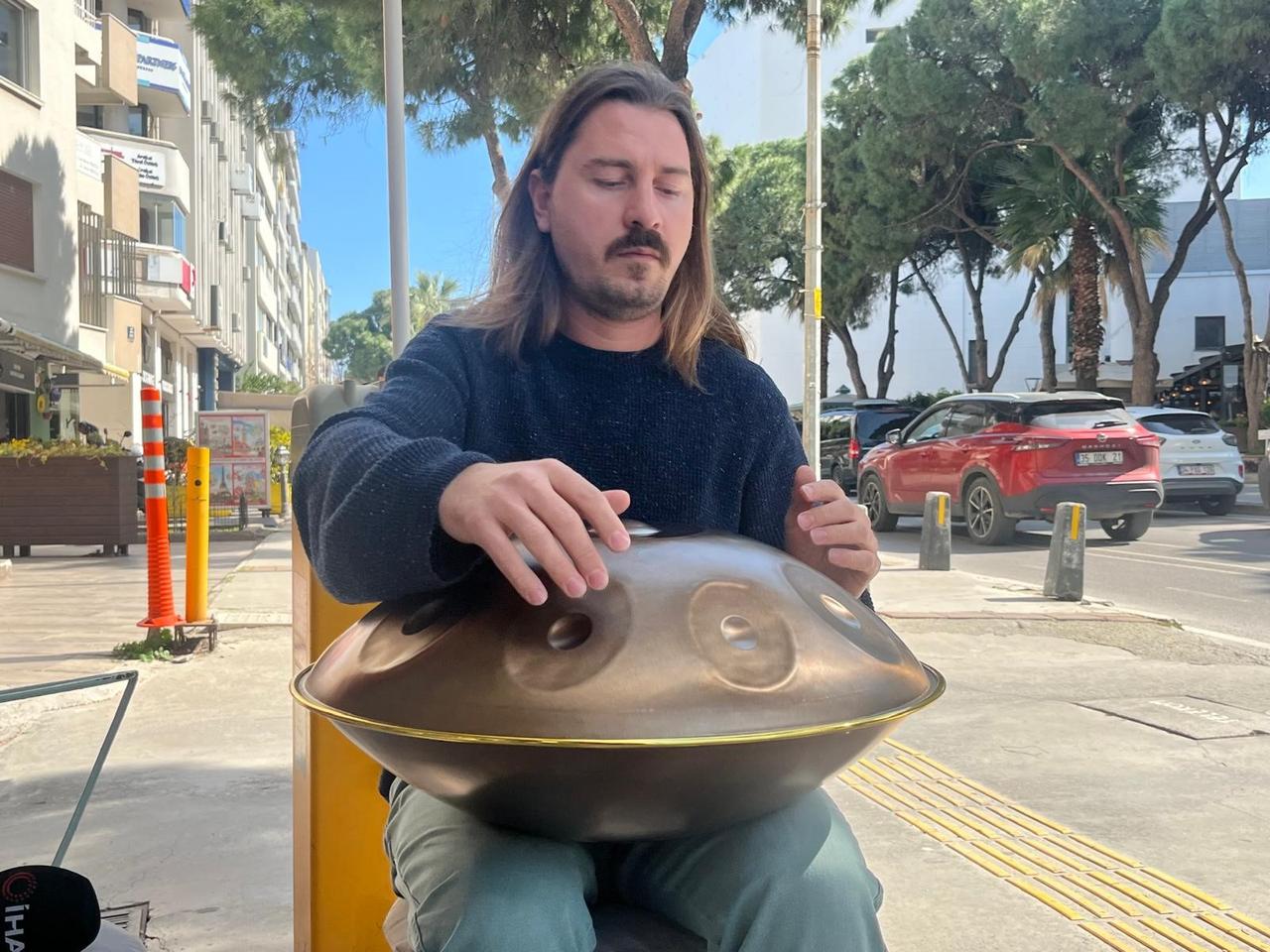 Yavuz Baskurt revives the centuries-old sound healing tradition from Tibet and Central Asia using modern instruments. Izmir, Türkiye, March 20, 2026. (IHA Photo)