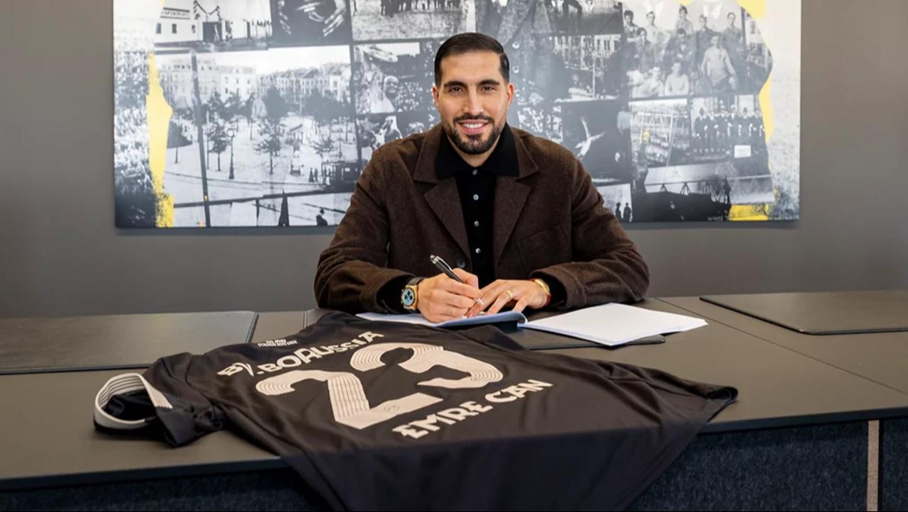 Borussia Dortmund captain Emre Can signs a contract extension at the club’s headquarters in Dortmund, Germany, March 21, 2026. (Photo via BVB.de)