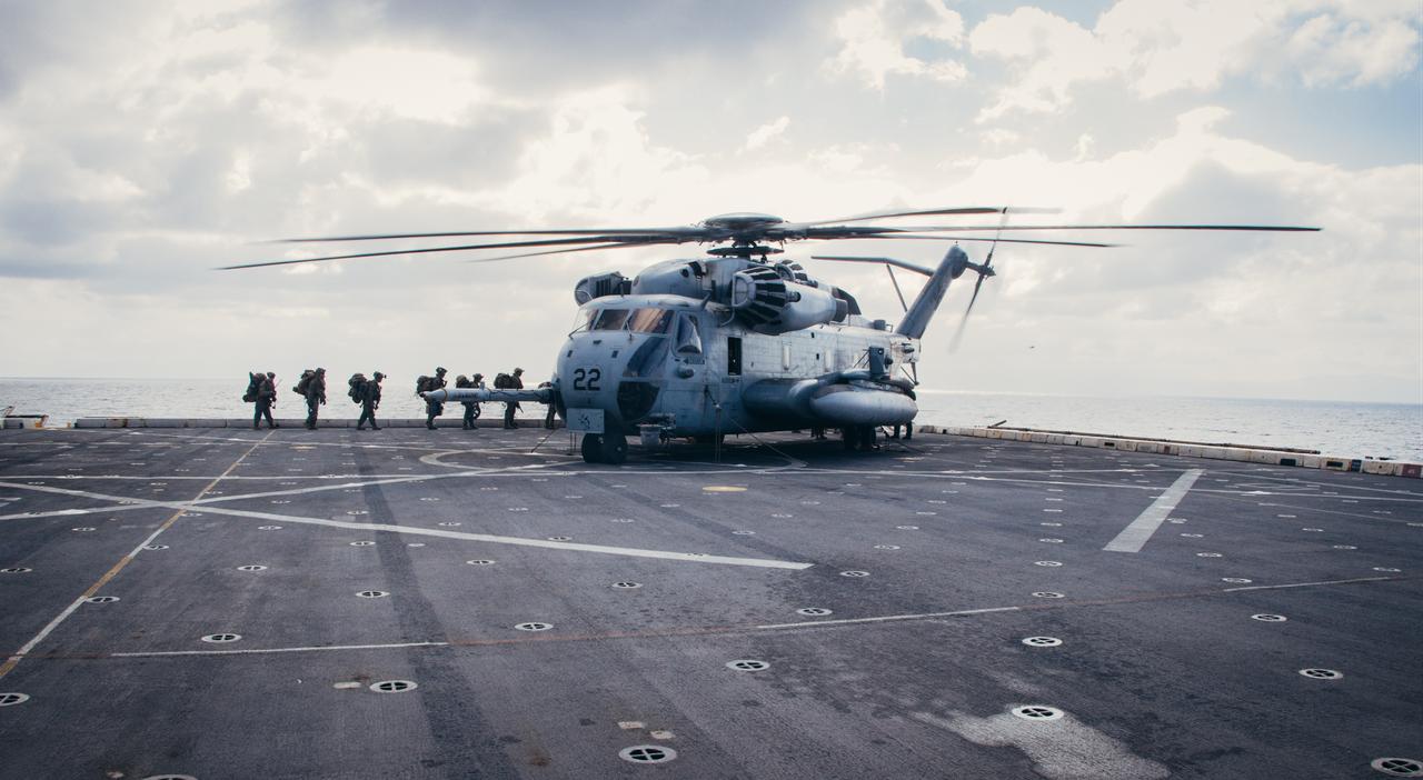 U.S. Marines assigned to the Ground Combat Element prepare to board a CH-53E Super Stallion while on the USS Mesa Verde (LPD 19) Mediterranean Sea, Feb. 18, 2024. (Photo via U.S. Marine Corps)