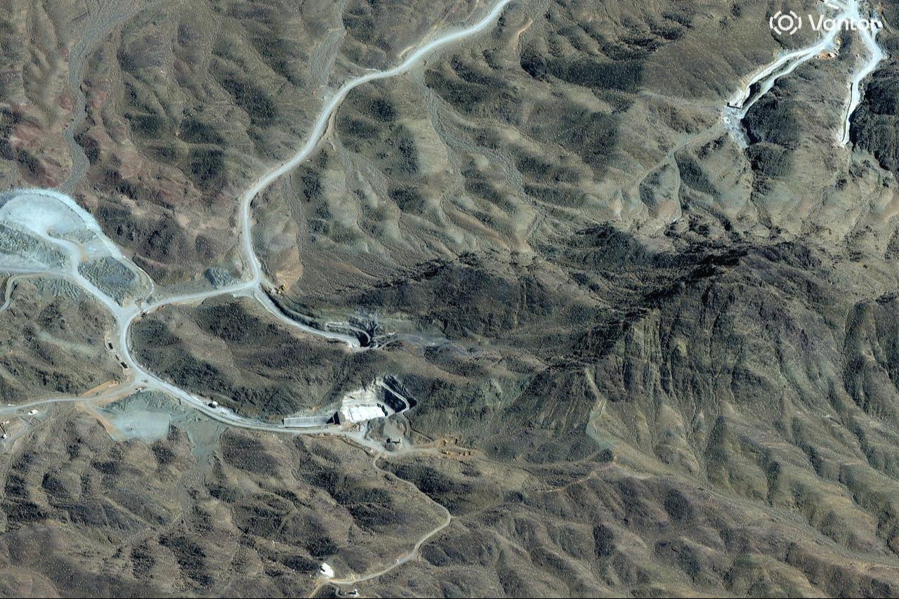 This handout satellite image shows an overview of the Pickaxe Mountain tunnel complex adjacent to the Natanz Nuclear Facility near Natanz, Isfahan province, in central Iran, March 7, 2026. (Photo by Satellite image ©2026 Vantor/AFP)
