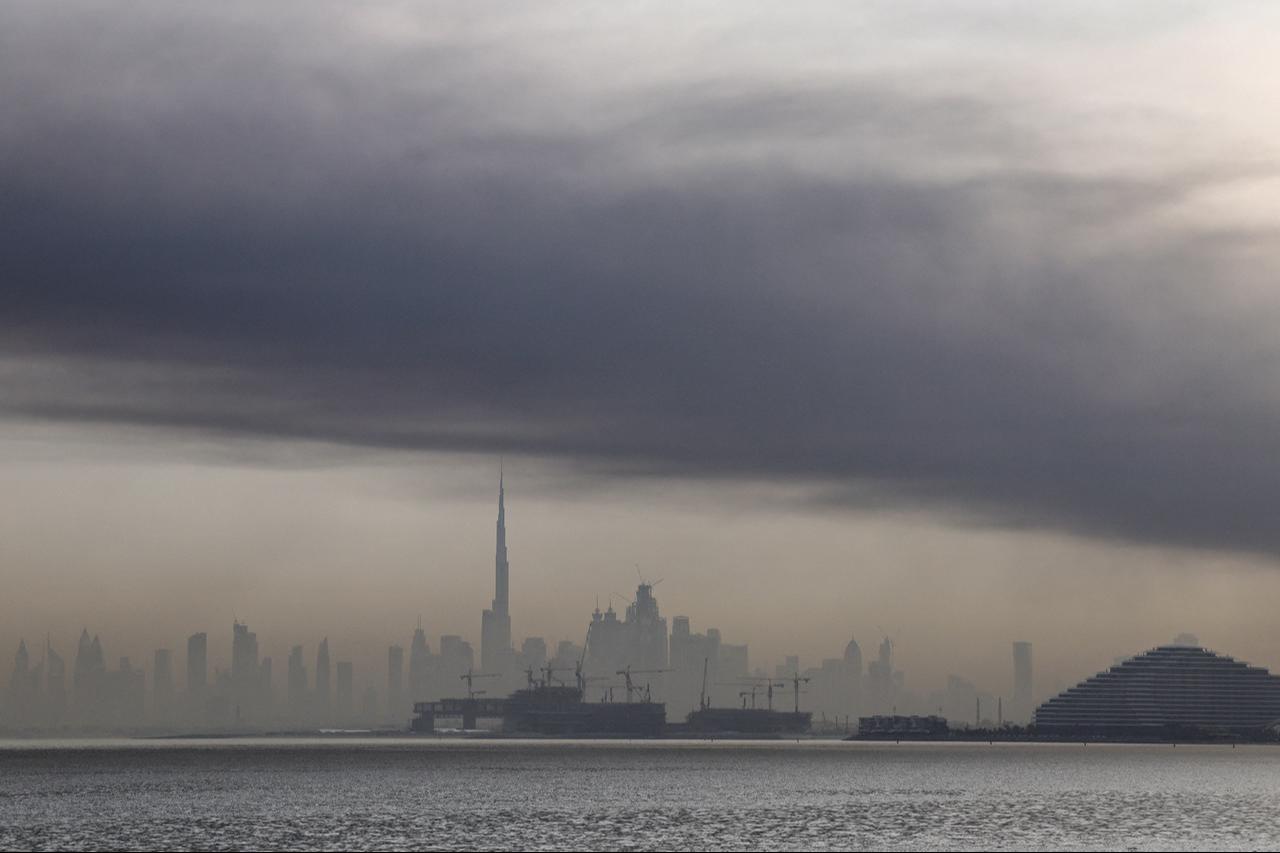 Smoke rises above Dubai after explosions rattle buildings, leaving a large cloud hanging over a central area of the Middle East financial hub in the UAE, March 13, 2026. (AFP Photo)