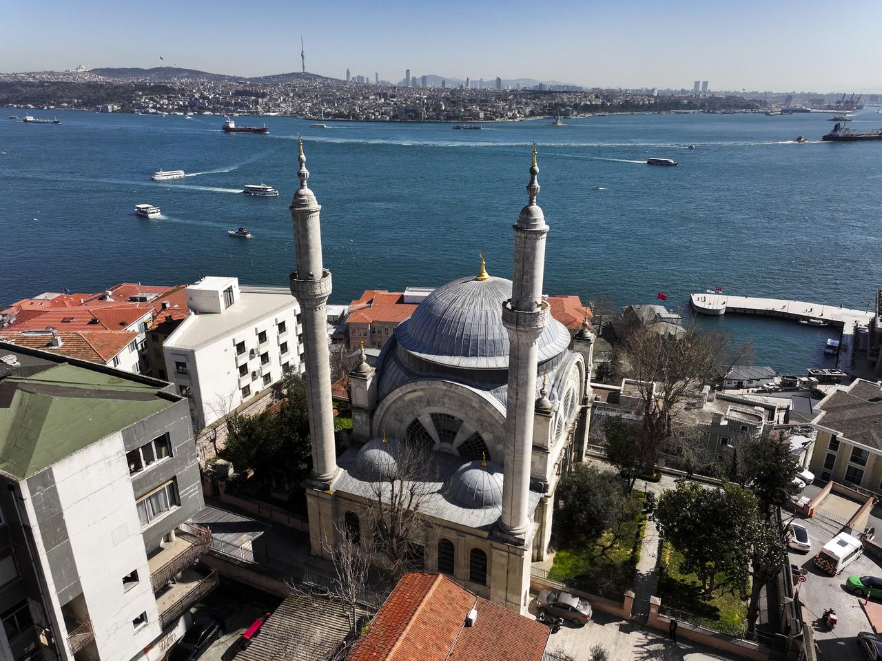 An aerial view of the Cihangir Mosque as it stands as both a place of worship and a quiet testament to the enduring legacy of the Ottoman Empire, overlooking the sweeping waters of the Bosphorus and the Marmara Sea at Beyoglu district in Istanbul, Türkiye, March 10, 2026. (AA Photo)