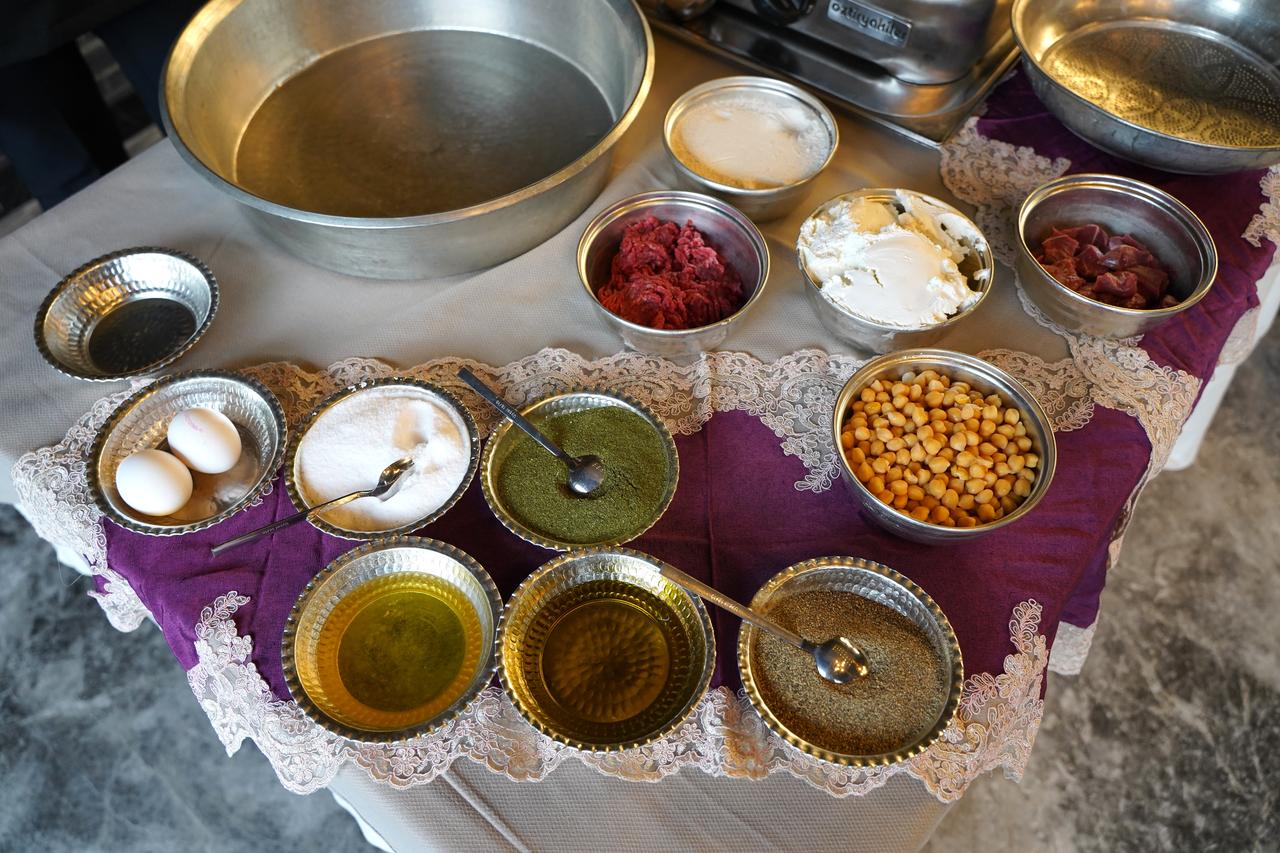 Ingredients used in preparing yuvalama, including chickpeas, yogurt, meat and spices, are displayed in Türkiye, March 22, 2026. (AA Photo)