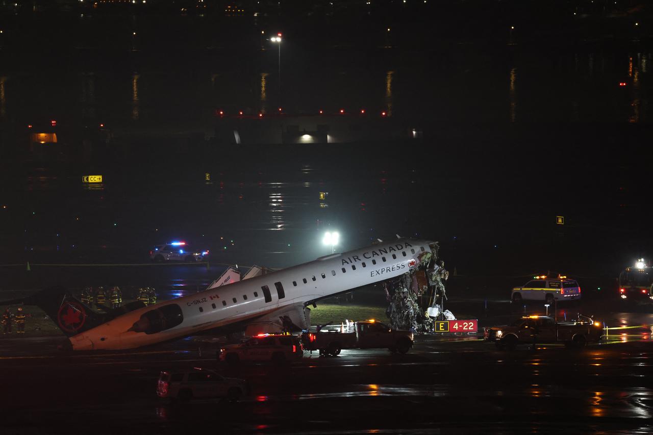 Plane hits ground vehicle at LaGuardia Airport in New York, halting flights