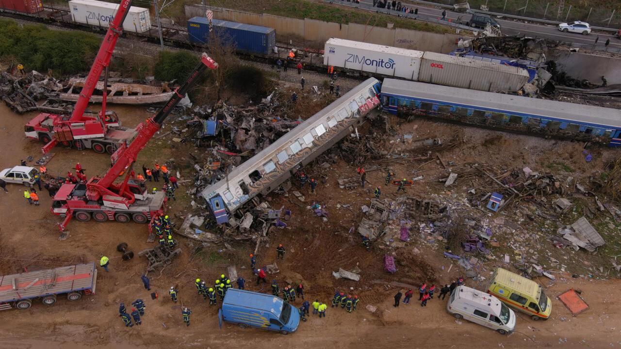 Emergency responders work at the site of a train collision near Larissa, Greece, on March 1, 2023. (Photo via AFP)