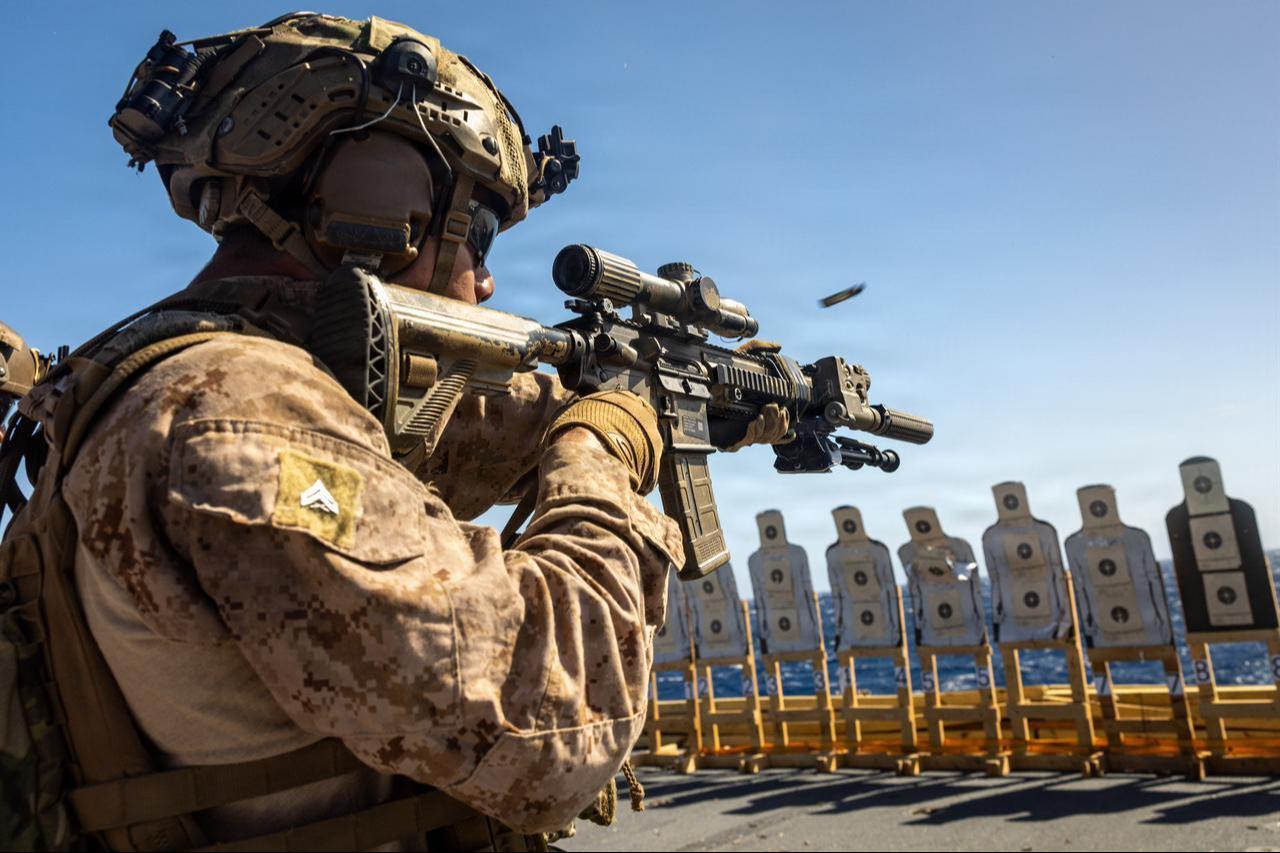A U.S. Marine engages a target during a deck shoot aboard San Antonio-class amphibious transport dock USS Fort Lauderdale (LPD 28) while underway in the Caribbean Sea, March 2, 2026. (Photo via U.S. Marine Corps)