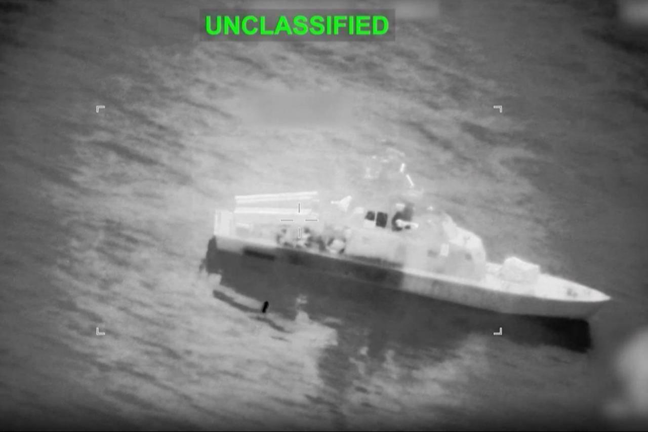 This screen grab obtained from video released by the CENTCOM on March 10, 2026 shows what they say is an Iranian naval vessel just before it is struck by a projectile "near the Strait of Hormuz" on March 10, 2026. (AFP Photo)