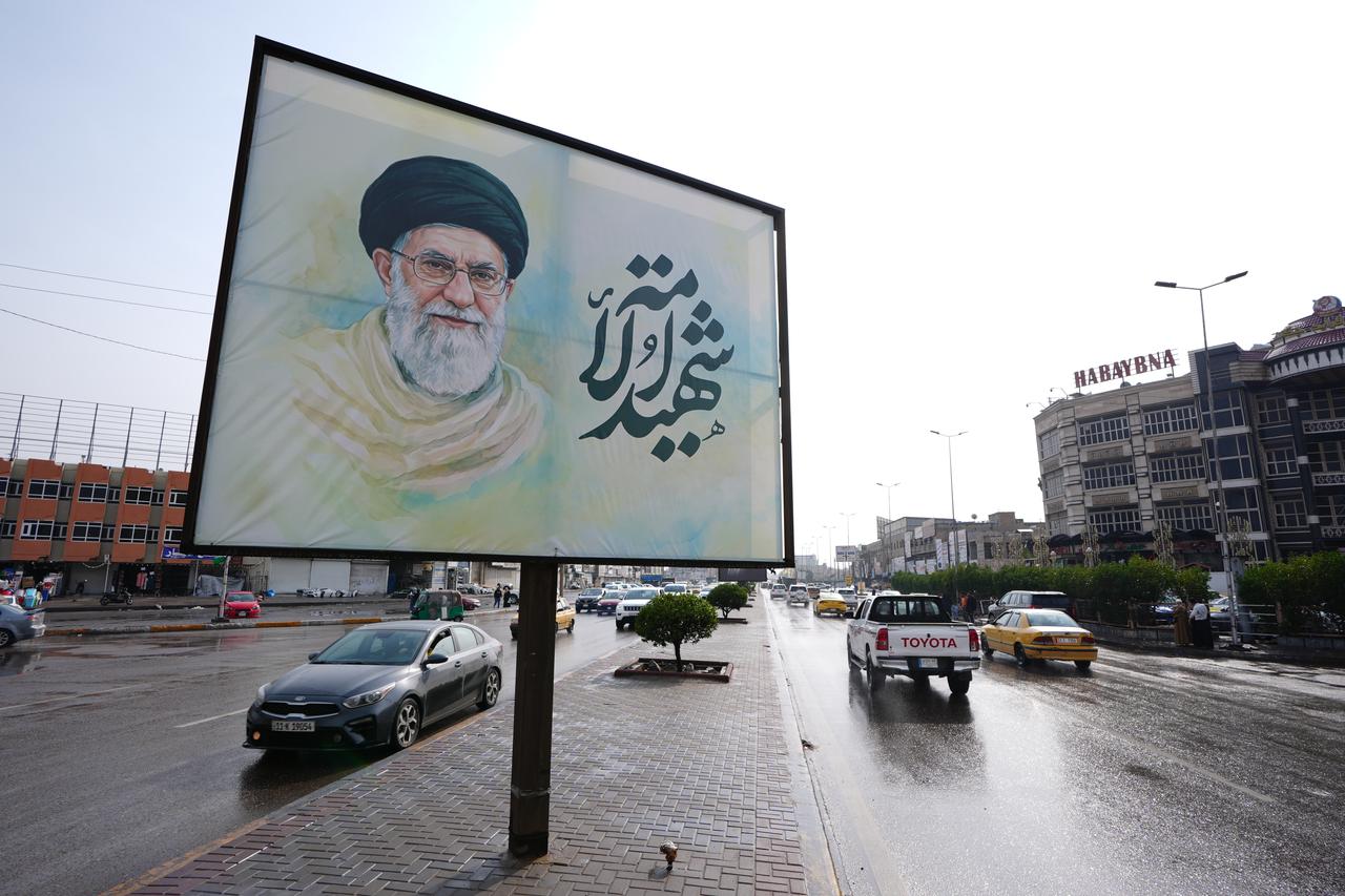 Posters featuring Iran's former leader Ali Khamenei, who was killed in a recent US-Israeli strike, have been displayed across the Iraqi capital Baghdad on March 22, 2026. (AA Photo)