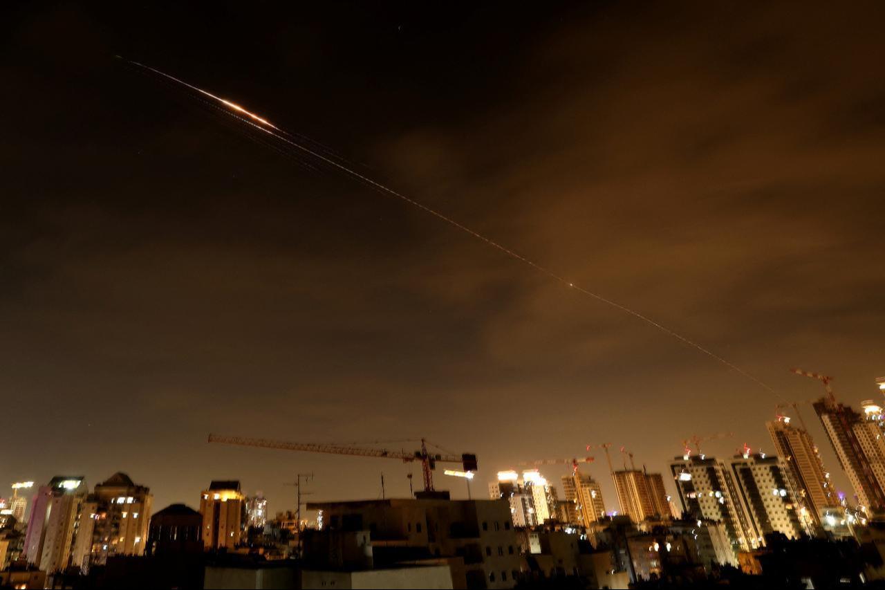 Rocket trails are seen in the sky amid a fresh barrage of Iranian missile attacks above the Israeli coastal city of Netanya on March 23, 2026. (AFP Photo)