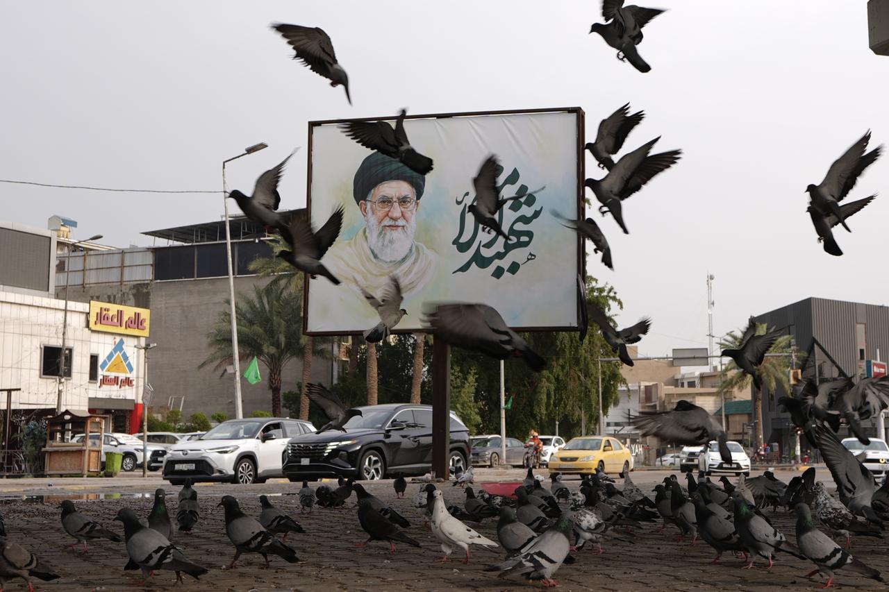 Posters featuring Iran’s new leader Mojtaba Khamenei and former leader Ayatollah Ali Khamenei, who was killed in a recent US-Israeli strike, have been displayed across the Iraqi capital Baghdad on March 22, 2026. (AA Photo)