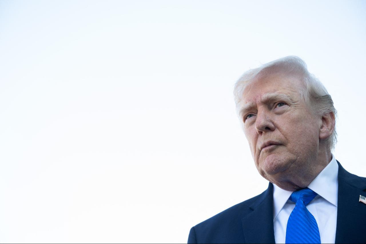 US President Donald Trump speaks to reporters before boarding Air Force One at Palm Beach International Airport in West Palm Beach, Florida, March 23, 2026. (AFP Photo)