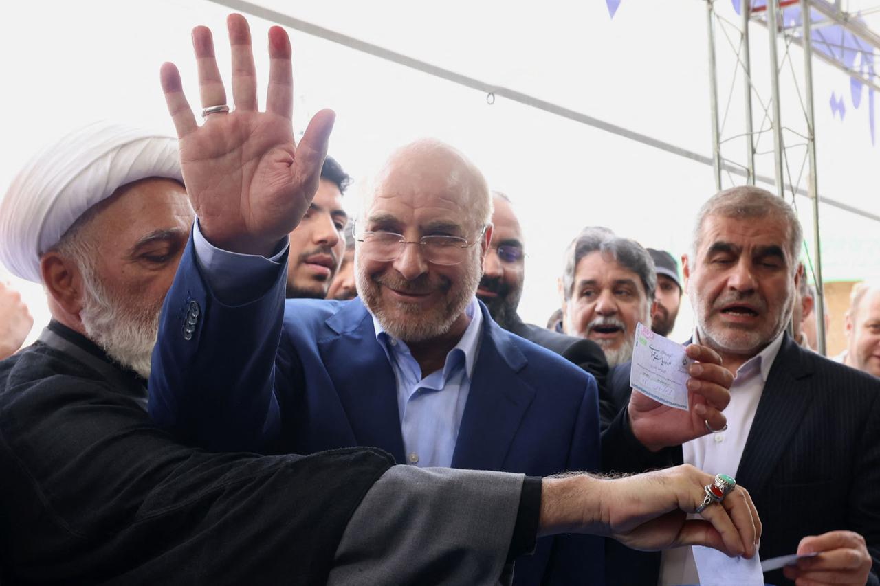 Iran's parliament speaker Mohammad Bagher Ghalibaf waves after casting his vote during the presidential election in Tehran on June 28, 2024. (AFP Photo)