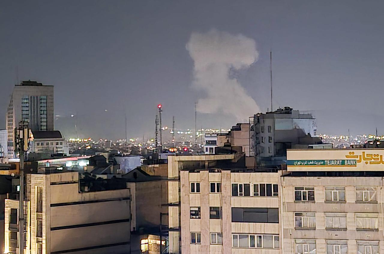 Smoke rise after explosions as the Israeli army announced a new wave of attacks on Tehran, the capital of Iran, on March 22, 2026. (AA Photo)