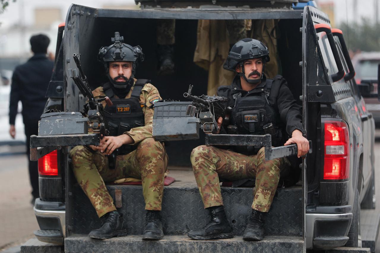 Members of Iraq’s Hashed al-Shaabi, an alliance of factions now integrated into the regular army, guard the streets during the funeral for members of the Hashed al-Shaabi Forces in Baghdad, March 24, 2026. (AFP Photo)