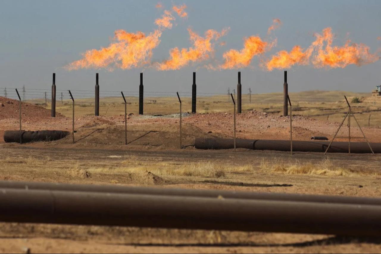 Excess flammable gasses burning from gas flares at the Bai Hassan oil field, west of the multi-ethnic northern Iraqi city of Kirkuk, Iraq on Oct. 17, 2017. (AFP Photo)