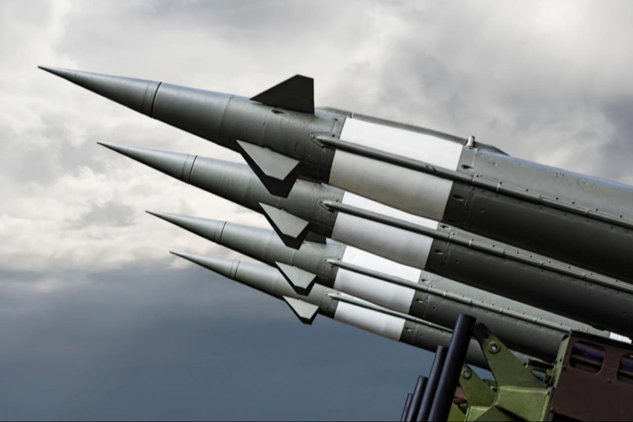 Nuclear missiles with warheads aimed at gloomy sky, date and time undisclosed. (Adobe Stock Photo)