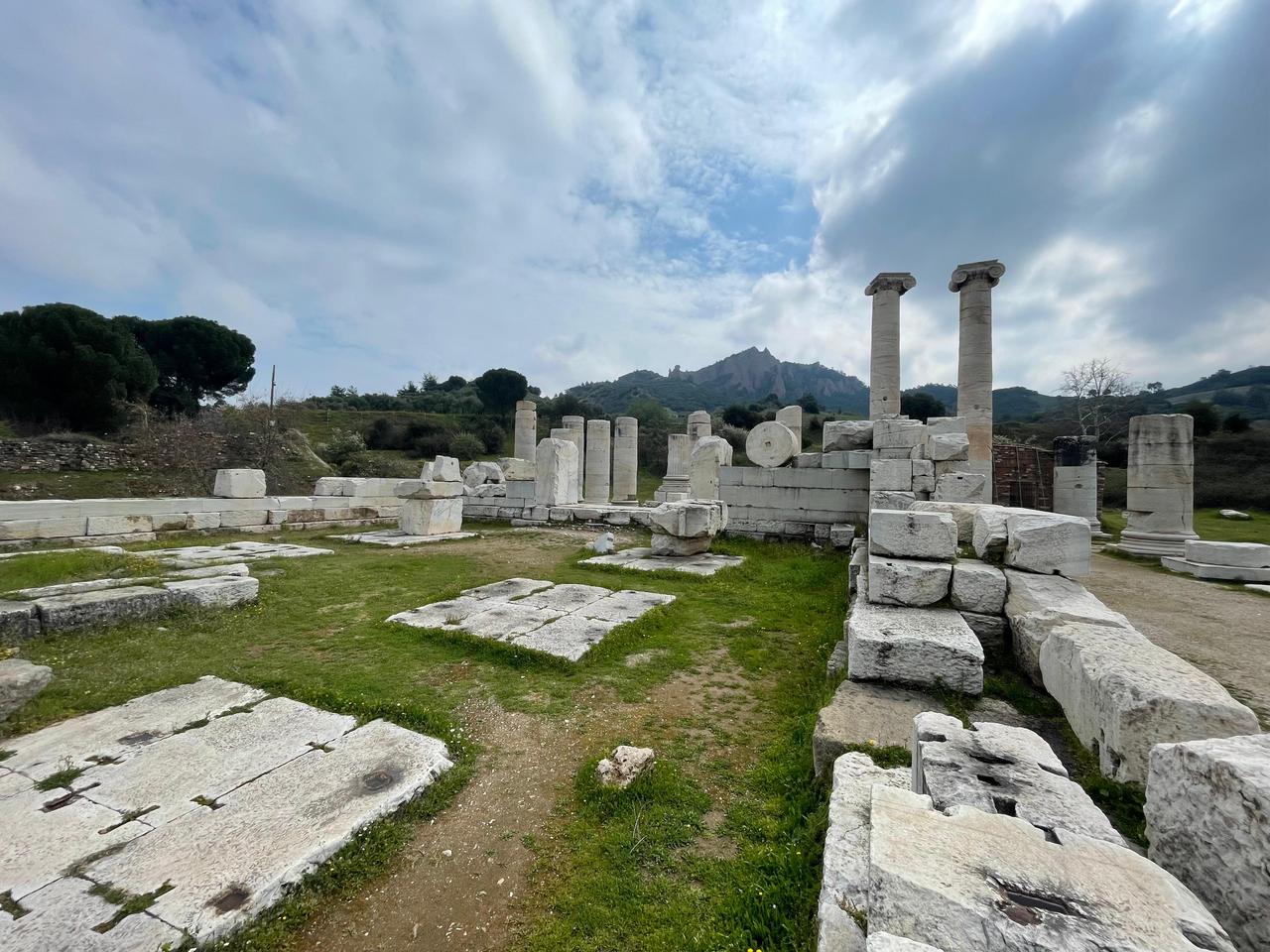 A wide view of the Temple of Artemis reveals scattered architectural remains and the surrounding landscape of ancient Sardis, Manisa, Türkiye, March 23, 2026. (Photo by Koray Erdogan/Türkiye Today)