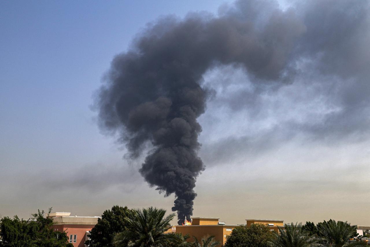 A smoke plume rises from an ongoing fire near Dubai International Airport in Dubai, United Arab Emirates on March 16, 2026. (AFP Photo)