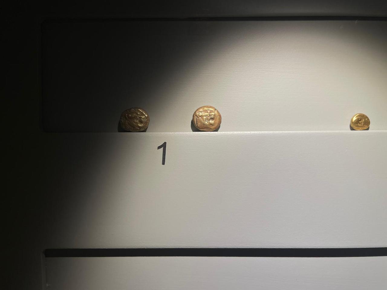 Ancient Lydian coins, including early electrum issues, are displayed at Manisa Museum in Manisa, Türkiye, March 25, 2026. (Photo by Koray Erdogan/Türkiye Today)