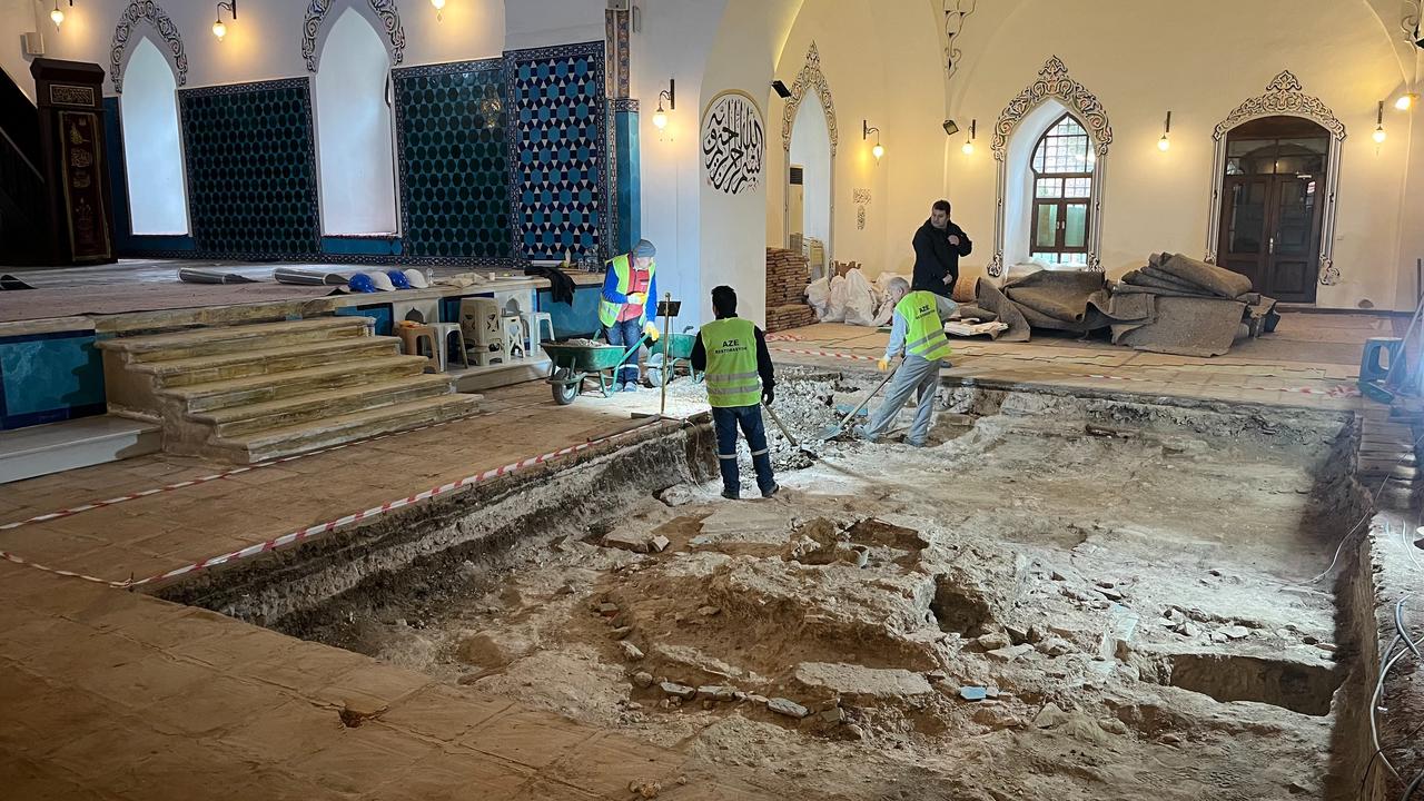 Excavation reveals the central layout of a buried pool structure within the mosque interior in Bursa, Türkiye, March 27, 2026. (IHA Photo)