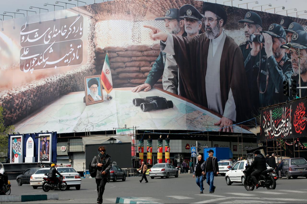 A view of a banner featuring Iran’s new Supreme Leader, Mojtaba Khamenei, and senior commanders of the Islamic Revolutionary Guard Corps, on March 14, 2026. (AA Photo)