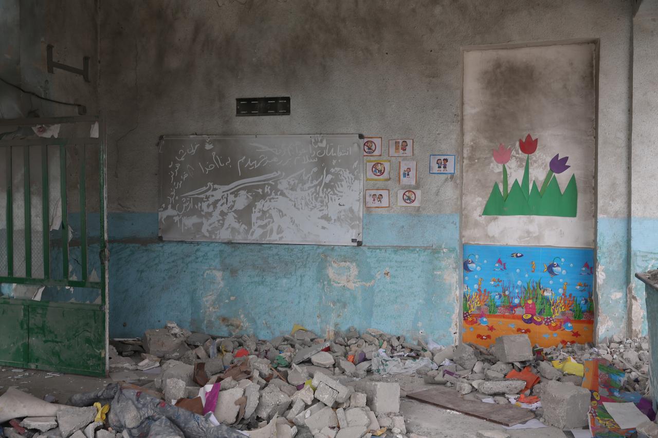 The destroyed building of Shajareh Tayyebeh Girl's School is seen after a US-Israel strike in Minab that killed 185 people, most of them children, in Hormozgan, Iran, March 21, 2026. (AA Photo)