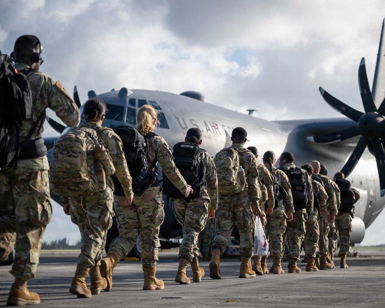 Air Force Reserve Airmen walk toward a C-130 Hercules at Homestead Air Reserve Base, Fla., March 8, 2026. (Photo via U.S. Air Force)