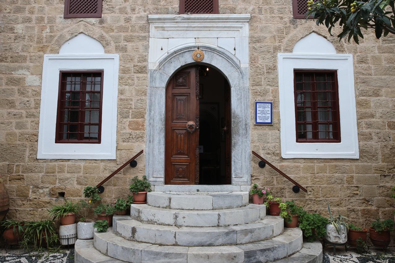 Exterior entrance of the Hafiz Ahmed Agha Library in Rhodes, reflecting Ottoman architectural heritage. (AA Photo)