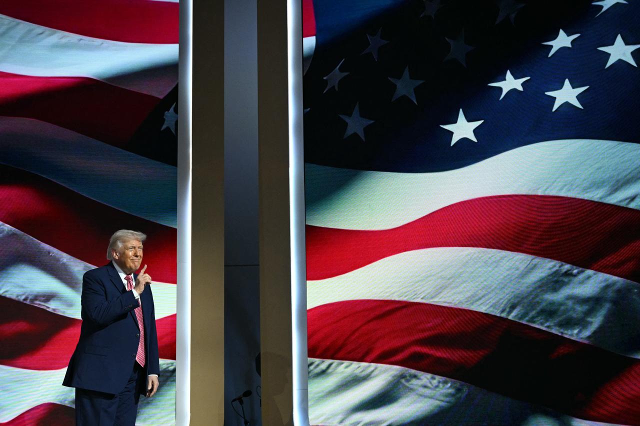 US President Donald Trump arrives on the stage to address the Future Investment Initiative (FII) Summit in Miami Beach, Florida, on March 27, 2026. (AFP Photo)