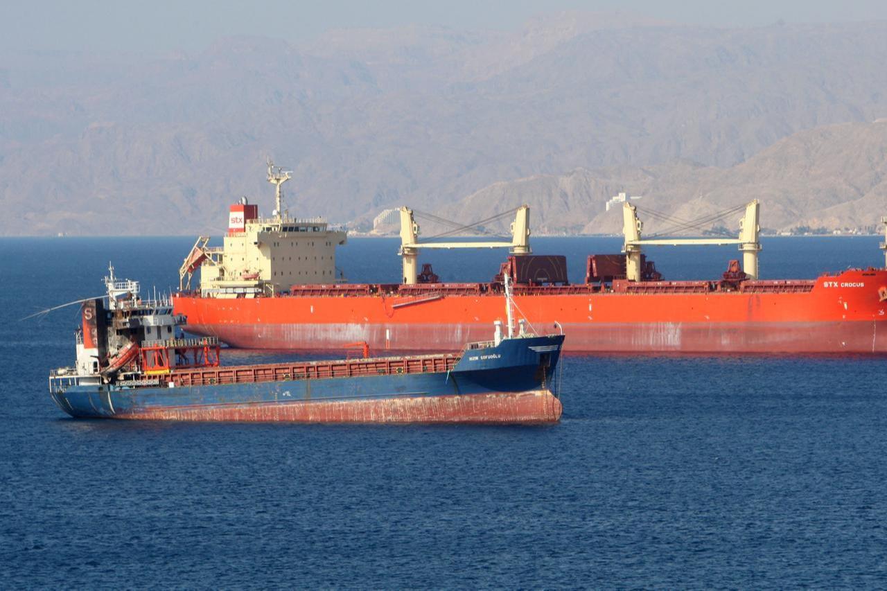 Cargo vessels sail near Aqaba, Jordan, along the Gulf of Aqaba on the Red Sea. (Adobe Stock Photo)