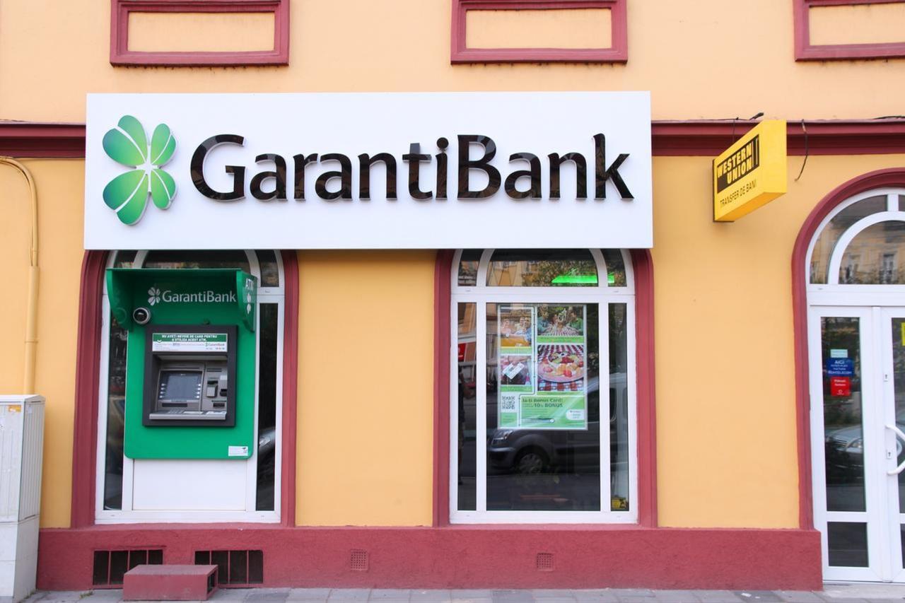 Garanti BBVA agrees to sell Romania unit to Raiffeisen Bank for €591M