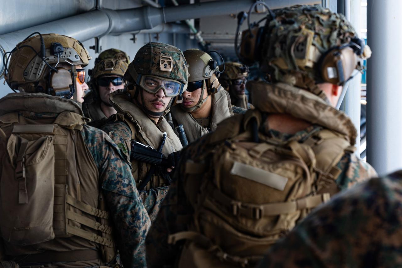 US Marines at the amphibious assault ship USS Tripoli, carrying 3,500 U.S. troops, reached the area of responsibility of U.S. Central Command, March 2026. (US CENTCOM/Handout)