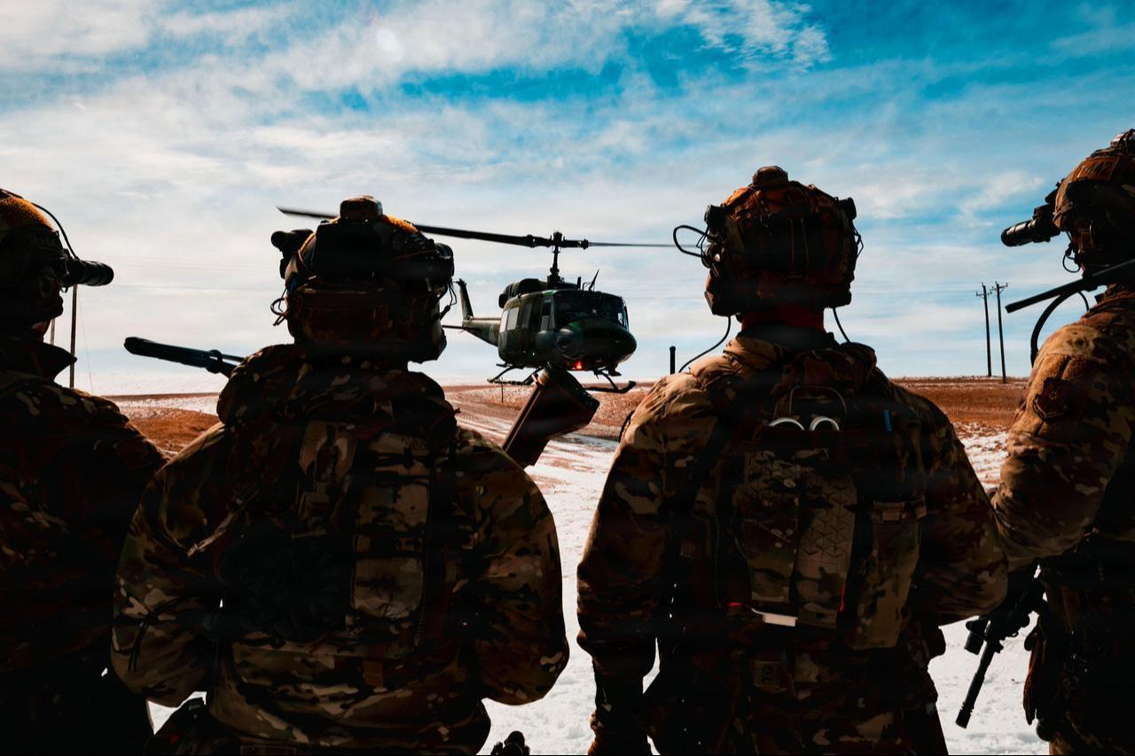 A UH-1N Huey lands as 90th Missile Security Operations Squadron Tactical Response Force defenders prepare to board at Launch Facility E-10 at Pine Bluffs, Wyo., Feb. 19, 2026. (Photo via U.S. Air Force)