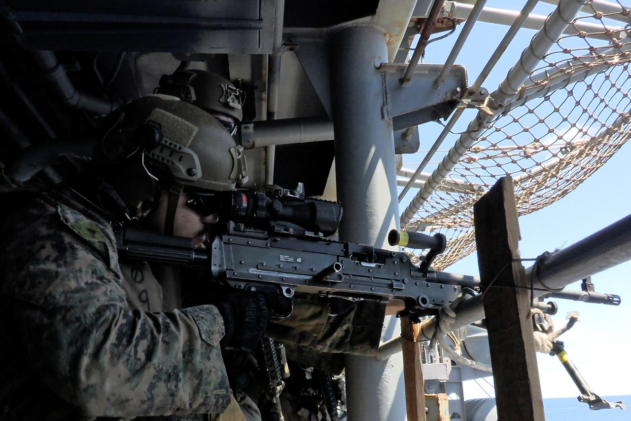 A US Marine at the amphibious assault ship USS Tripoli, carrying 3,500 U.S. troops, reached the area of responsibility of U.S. Central Command in March 2026. (US CENTCOM/Handout)