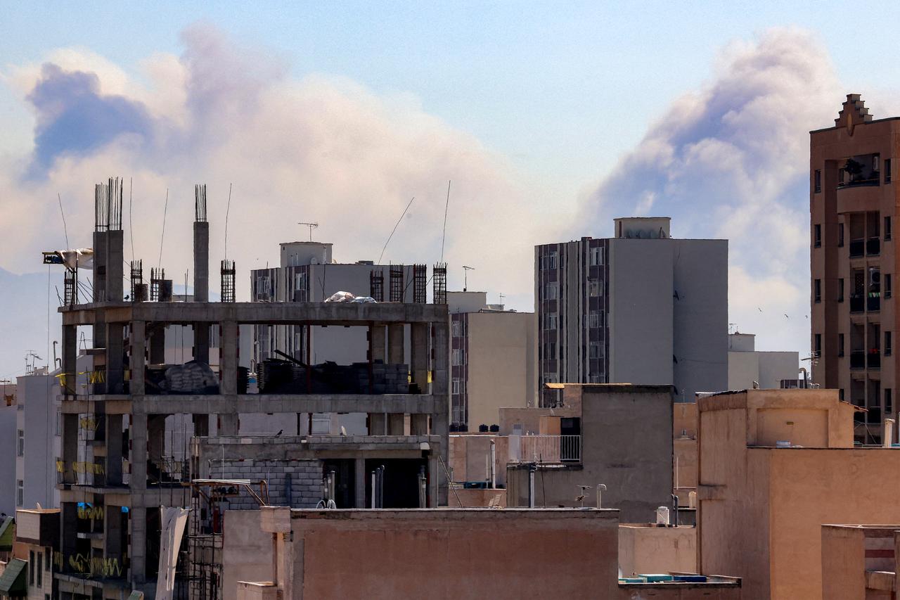 Plumes of smoke rise following reported explosions in Tehran on March 3, 2026. (AFP Photo)