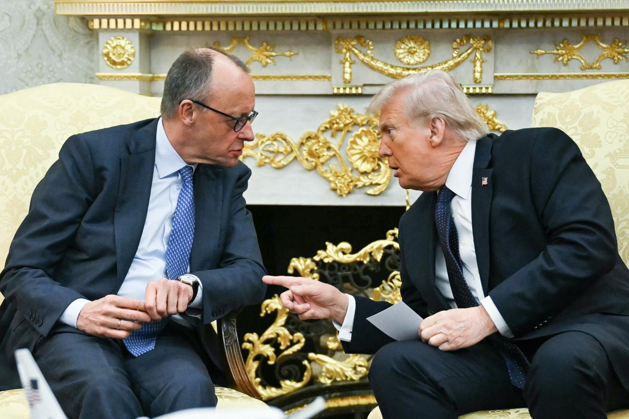 US President Donald Trump meets with German Chancellor Friedrich Merz in the Oval Office of the White House in Washington, DC on March 3, 2026. (AFP Photo)