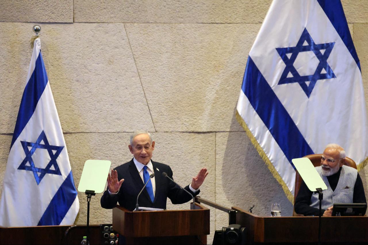 Israel's Prime Minister Benjamin Netanyahu (L) addresses the Israeli parliament, the Knesset, as his Indian counterpart Narendra Modi watches, in Jerusalem, Feb. 25, 2026. (AFP Photo)