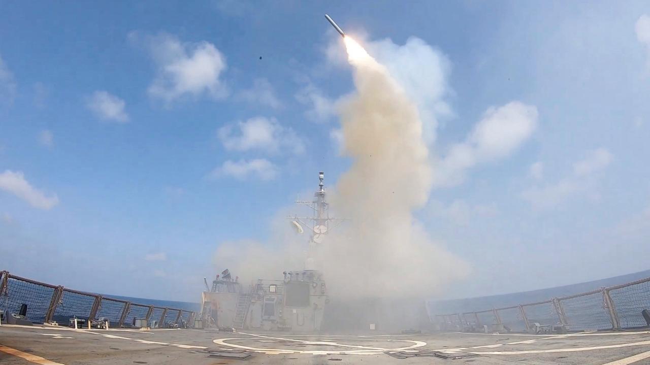In this screen grab obtained on February 28, 2026, from video released by the US Central Command on their X account @CENTCOM, shows the Arleigh Burke-class guided-missile destroyer USS Spruance (DDG 111) firing Tomahawk Land Attack Missiles, Feb. 28, 2026. (Photo by US Central Command (CENTCOM)/AFP)