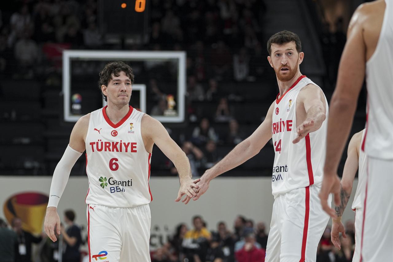 Cedi Osman (6) of Turkiye celebrates after a position during the FIBA Basketball World Cup 2027 European Qualifiers First Round Group C match at the Basketball Development Center in Istanbul, Türkiye, March 2, 2026. (AA Photo)