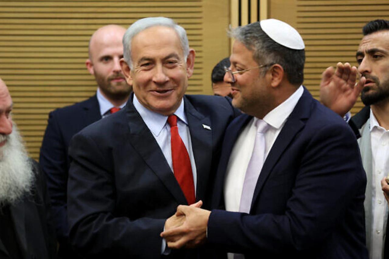 Prime Minister Benjamin Netanyahu (L), greets National Security Minister Itamar Ben Gvir (R) at the Knesset, Israel, May 23, 2023 (AFP Photo)