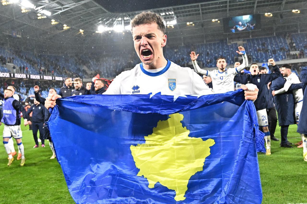Kosovo's forward #11 Fisnik Asllani celebrates after the play-off 2026 FIFA World Cup European qualification semi-final football match between Slovakia and Kosovo in Bratislava, March 26, 2026. (AFP Photo)