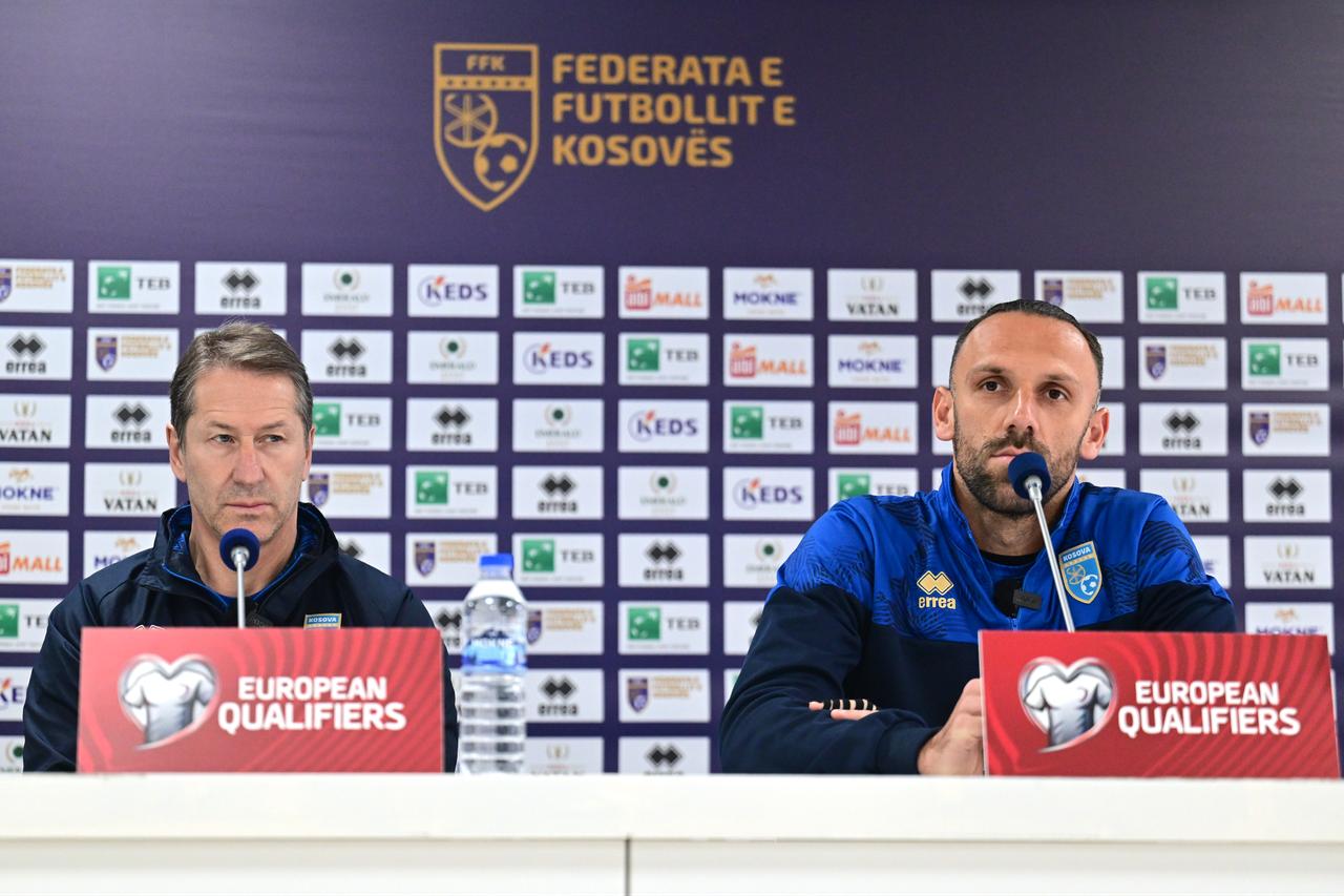 Head Coach of Kosovo Franco Foda (L) and player Vedat Muriqi (R) attend press conference ahead of 2026 FIFA World Cup European Qualifiers playoff round final match between Kosovo and Türkiye, in Pristine, Kosovo, March 30, 2026. (AA Photo)