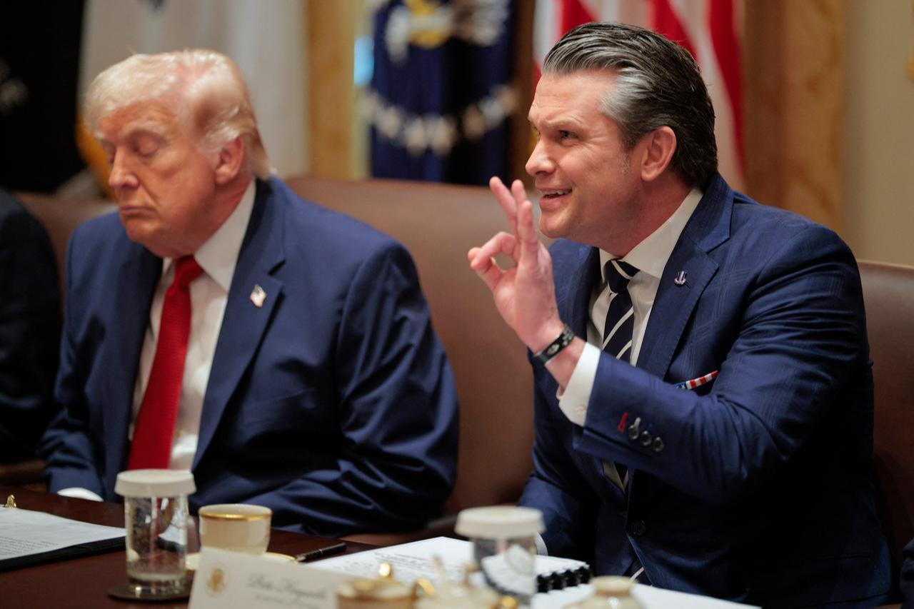 U.S. Secretary of War Pete Hegseth gestures as he speaks during a Cabinet meeting in the Cabinet Room of the White House, March 26, 2026 in Washington, DC. (AFP Photo)
