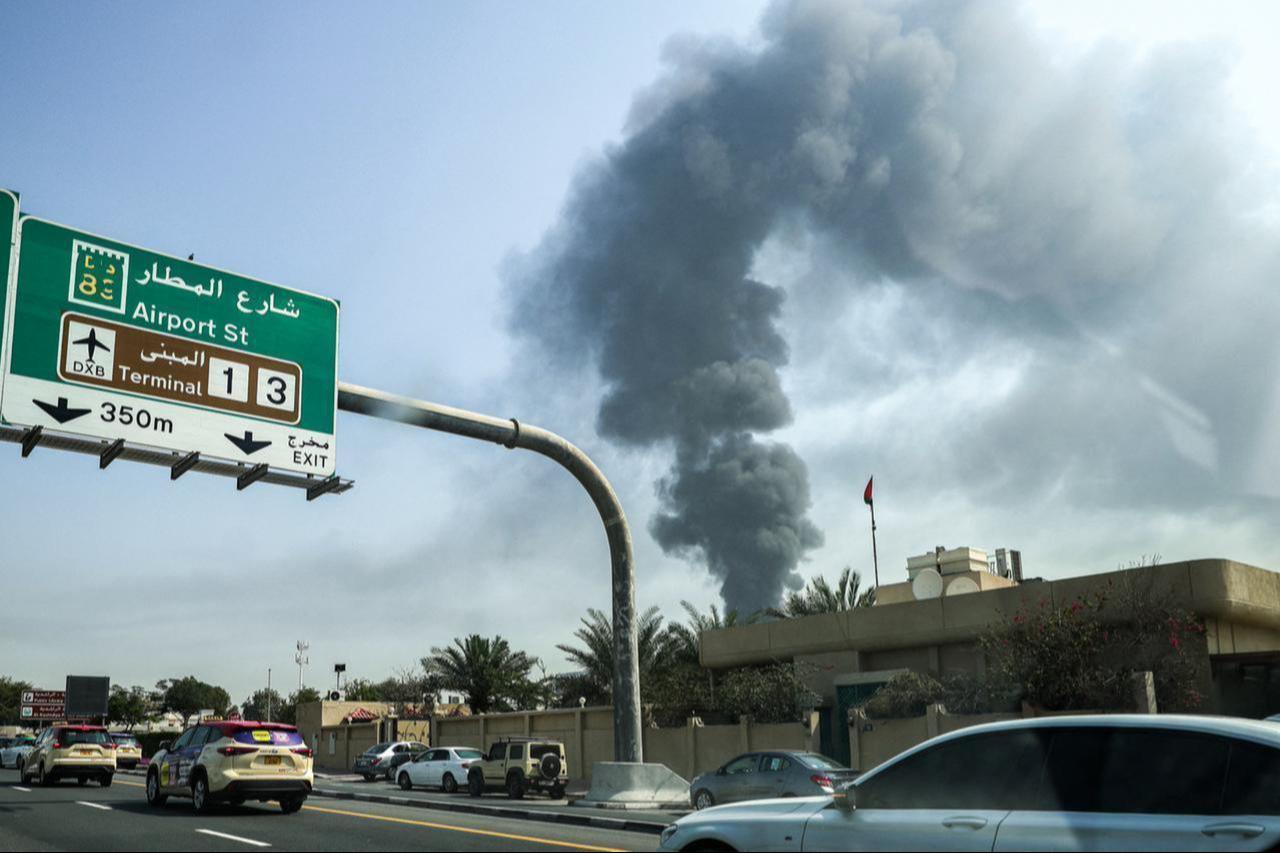 A smoke plume rises from an ongoing fire near Dubai International Airport in Dubai on March 16, 2026. (AFP Photo)