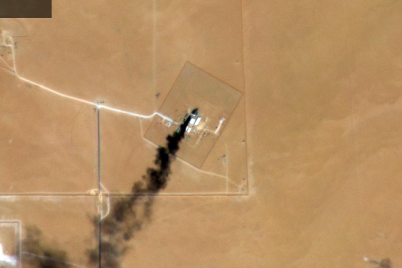 Satellite imagery shows smoke rising from a building at Prince Sultan Air Base in Saudi Arabia, March 1, 2026. (Photo via New York Times/Planet Labs)