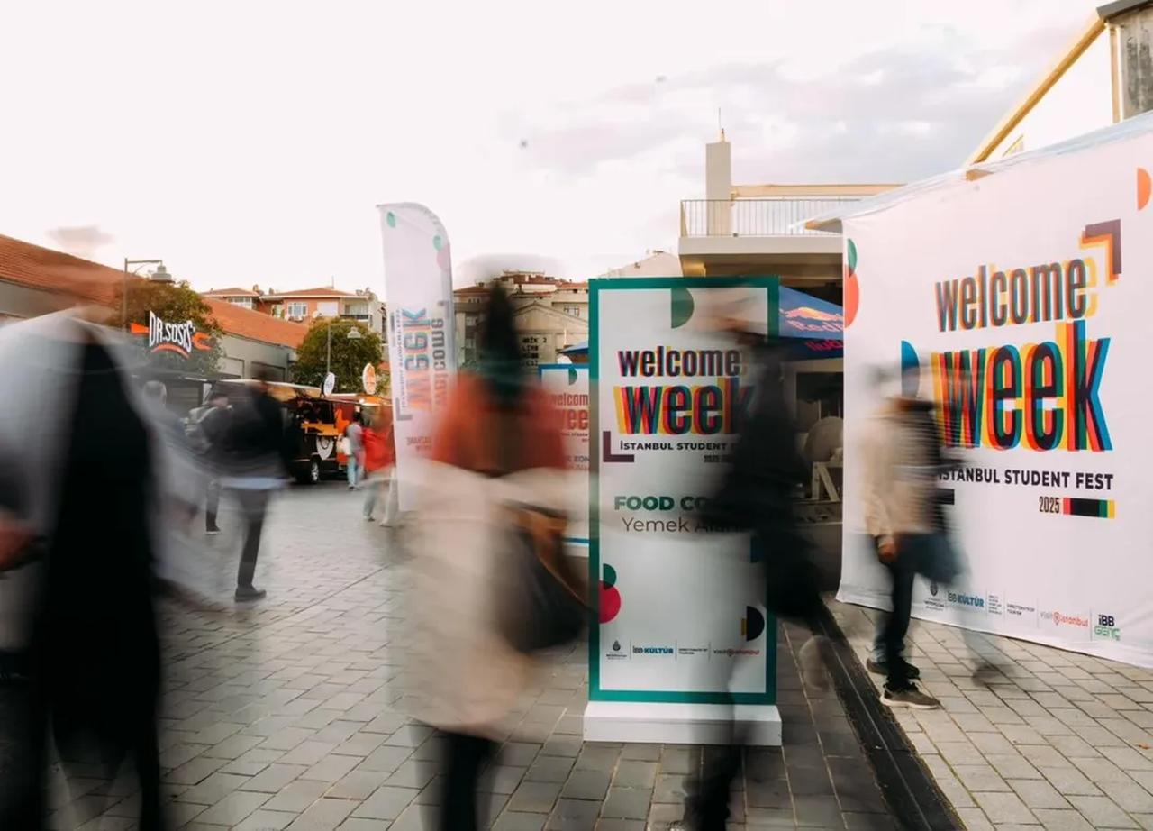 Visitors walk past signage during Istanbul Welcome Week student events, Istanbul, Türkiye, February 28, 2026. (Photo via Instagram / @ibb_kultur)